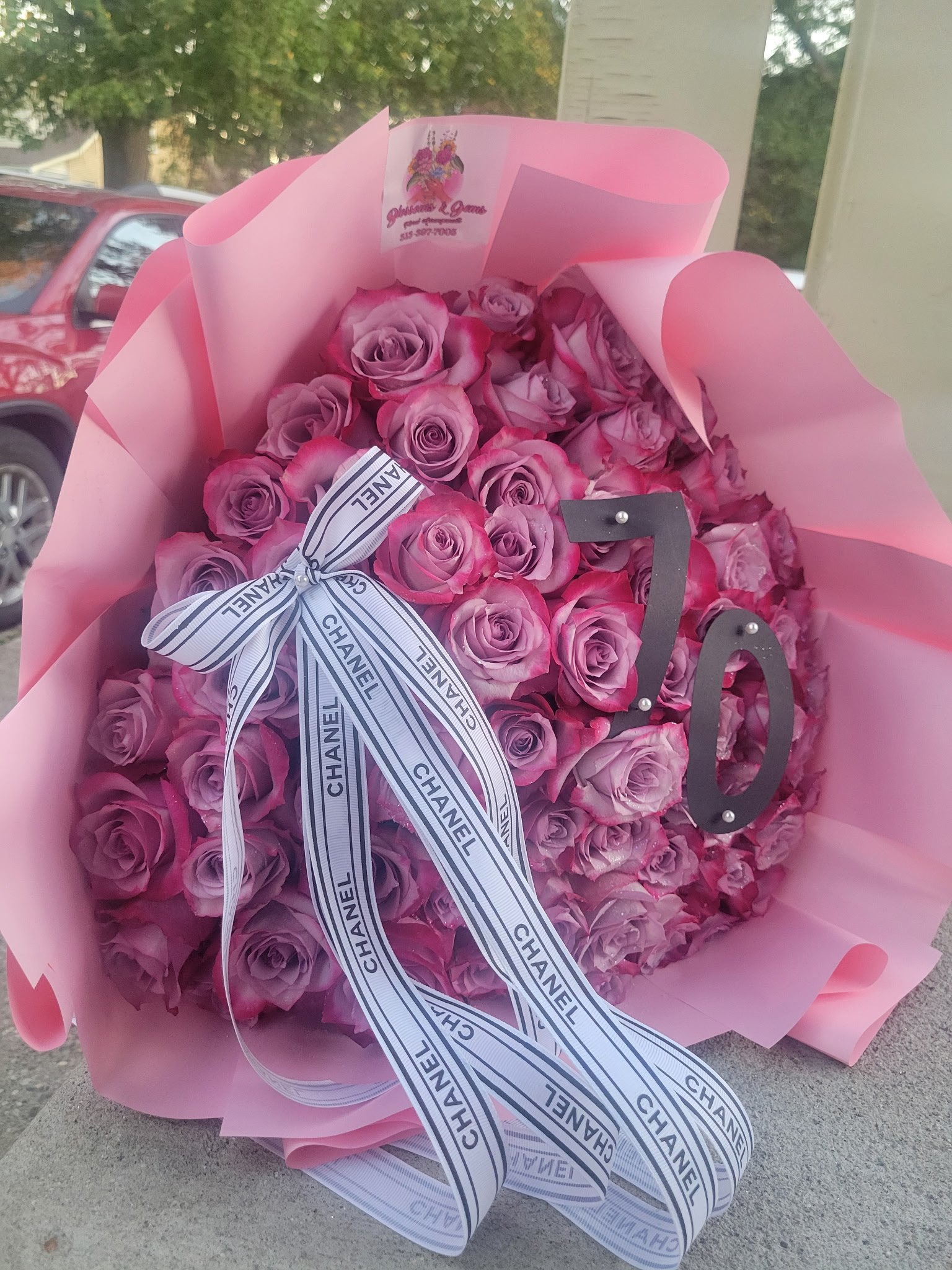Pink roses with the number 70, from Blossoms & Gems